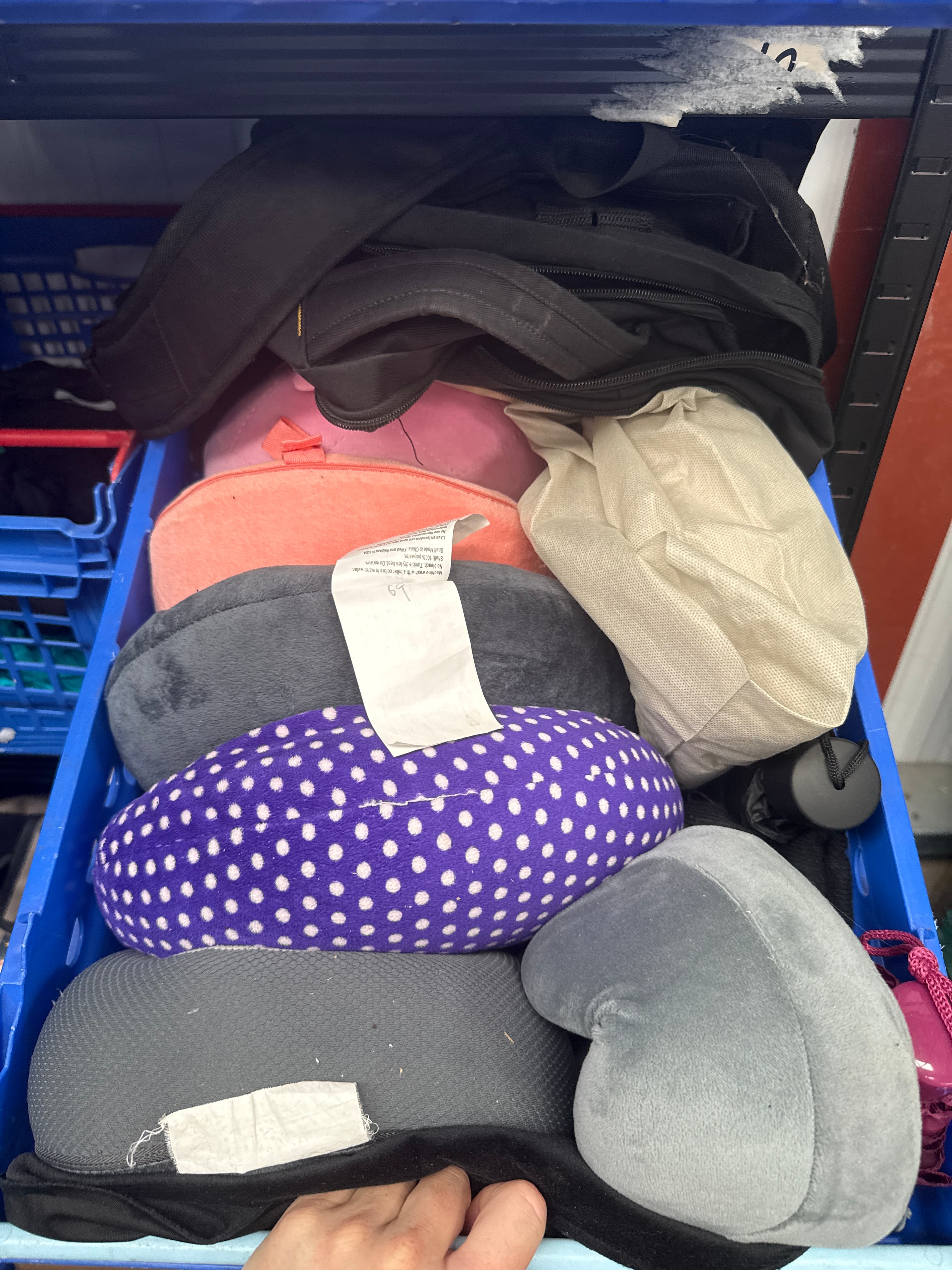 Neck pillows umbrellas and backpacks